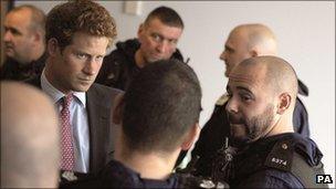 Prince Harry meets police in Salford