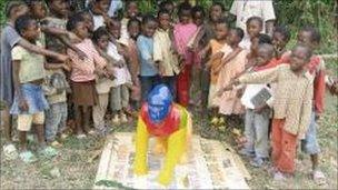 Children with gorilla at Metet School, Cameroon