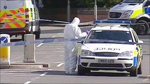 The main A4051 Malpas Road was closed and cordoned off by police