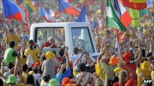 Pope Benedict XVI arrives to celebrate a mass at the Cuatro Vientos air base outside Madrid during the World Youth Day festivities on 21 August 2011