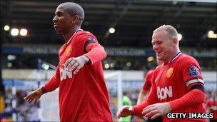 Ashley Young of Manchester United (left) celebrates scoring a goal for the club