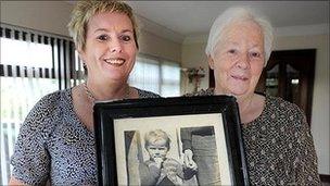 Pauline Brannigan and her mother Mary hold a photograph of Pauline taken when she was two