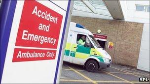 Ambulance leaving Accident and Emergency outside a hospital