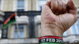 Demonstrator outside the Libyan Embassy in London