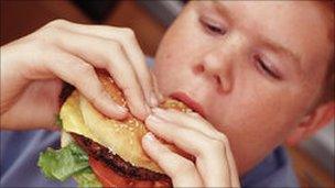 Person eating a burger