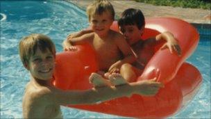 Oscar (C) in the pool with his cousins and brother 1991