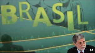 Brazil's new Defense Minister Celso Amorim looks on during his swearing in ceremony at the Planalto palace in Brasilia, 8 August 2011