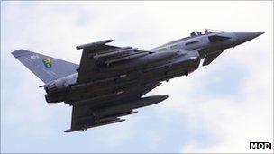 RAF Typhoon jet fighter flying over the Italian Airforce base of Gioia del Colle near Bari in southern Italy to patrol the no-fly-zone over Libya