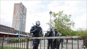 Riot police in front of Salford Shopping City