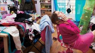 Student in messy room