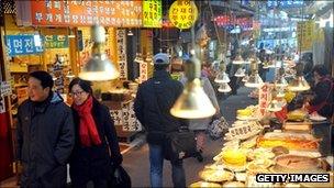 Consumers at a food market in Korea