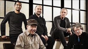 Steve Reich (seated with cap) with Kronos Quartet. Photo by Jay Blakesberg