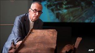 Francesc Torres with a section of steel from the ruins of the World Trade Center