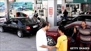 Libyans at a petrol station