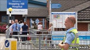 Security guard outside Stepping Hill Hospital in July