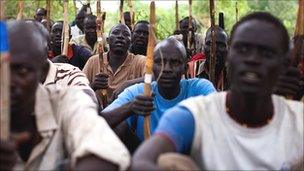 Recruits for the Sudan People's Liberation Army (SPLA) train in a secret camp in the Nuba mountains of South Kordofan 11 July 2011.