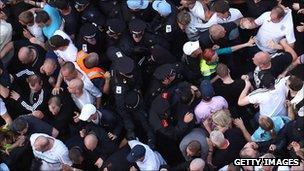 Police and EDL protesters clash in Tower Hamlets