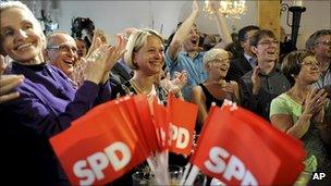 SPD supporters celebrate in Schwerin, northern Germany