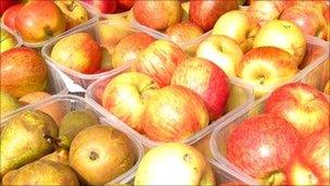 Apples and pears on sale in market