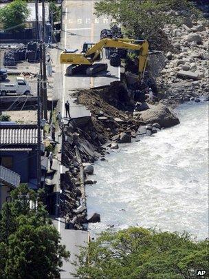 Road washed away by flood water in Nachikatsuura, Wakayama Prefecture, central Japan