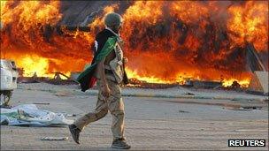 Gaddafi compound in flames