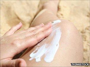 Suncream being rubbed in