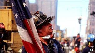 Rescue worker with US flag