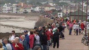 People wearing red for the Red Arrows in Jersey