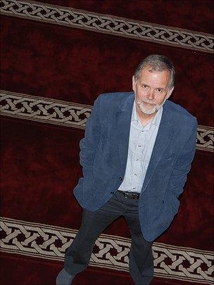 Bob Lambert, standing in the prayer hall at Finsbury Park Mosque