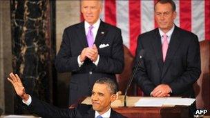 President Obama with Vice President Joe Biden and Speaker of the House John Boehner behind him