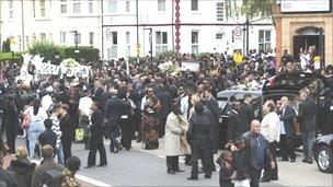 Mourners outside the New Testament Church of God