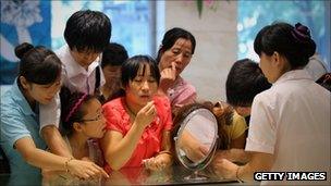 Chinese shoppers at a store in Beijing