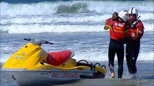 RNLI lifeguards taking part in a training exercise