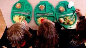 Children eating school dinners