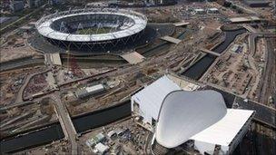 London's Olympic Stadium [top] and the Aquatics Centre