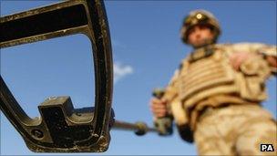 British soldier on a training exercise to detect IEDs in Camp Bastion in the Helmand province of Afghanistan