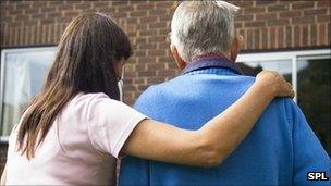 Carer with elderly man