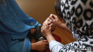 Afghan child receives polio vaccine