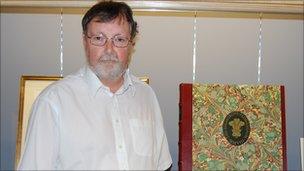 Alan Howell and a copy of the Highgrove Florilegium