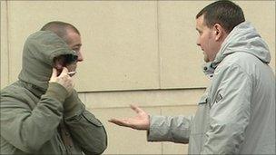 David 'Reggie Miller' (with hood up) with fellow defendants John Bond (left) and Darren Moore