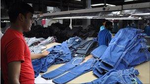 Pile of completed jeans in a Bangladeshi clothes factory