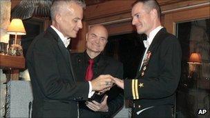 Navy Lt. Gary Ross, right, and Dan Swezy exchange wedding vows on 20 Sept 2011 in Vermont