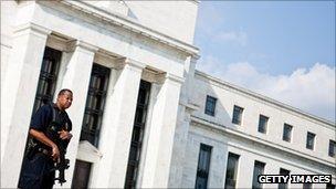 A police officer guarding the Federal Reserve building in Washington.