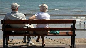 Elderly couple sitting on a bench