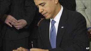 President Obama signs the Affordable Care Act in March 2010