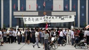 People gathered outside the Lufeng government office on 23 September 2011