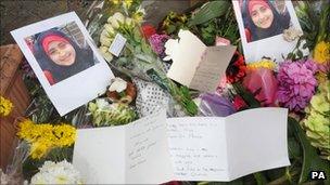 Tributes left outside the house in Neasden