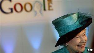 The Queen in front of Google logo