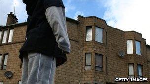 boy outside a home