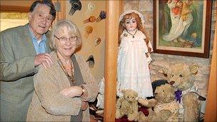 George and Barbara Sutton with some of the toys they are keeping for sentimental reasons